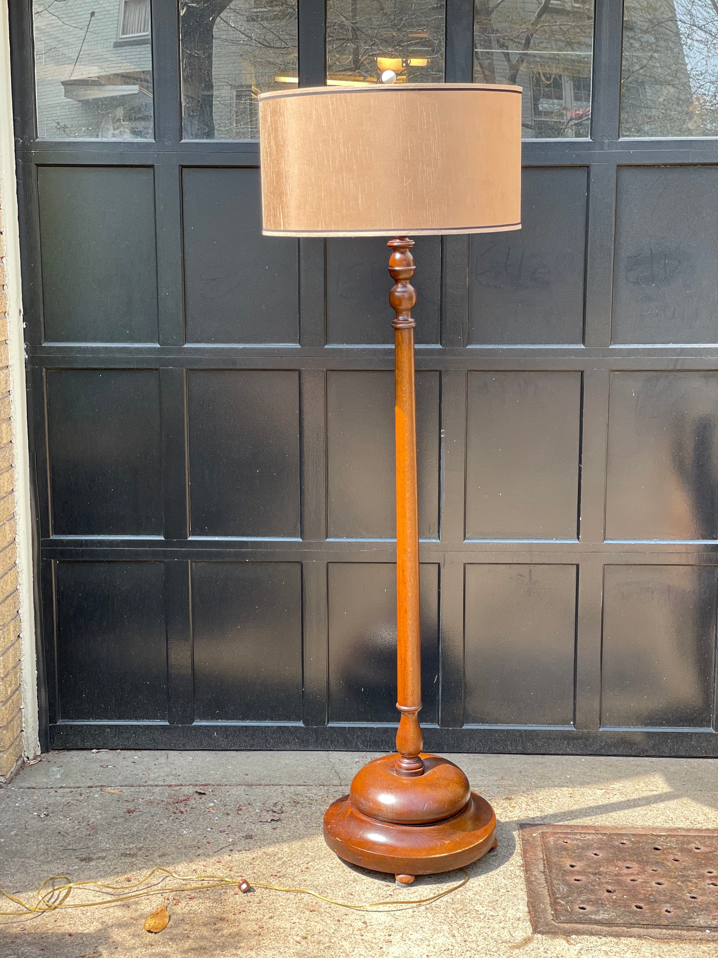 Tall wood floor lamp with a silk shade