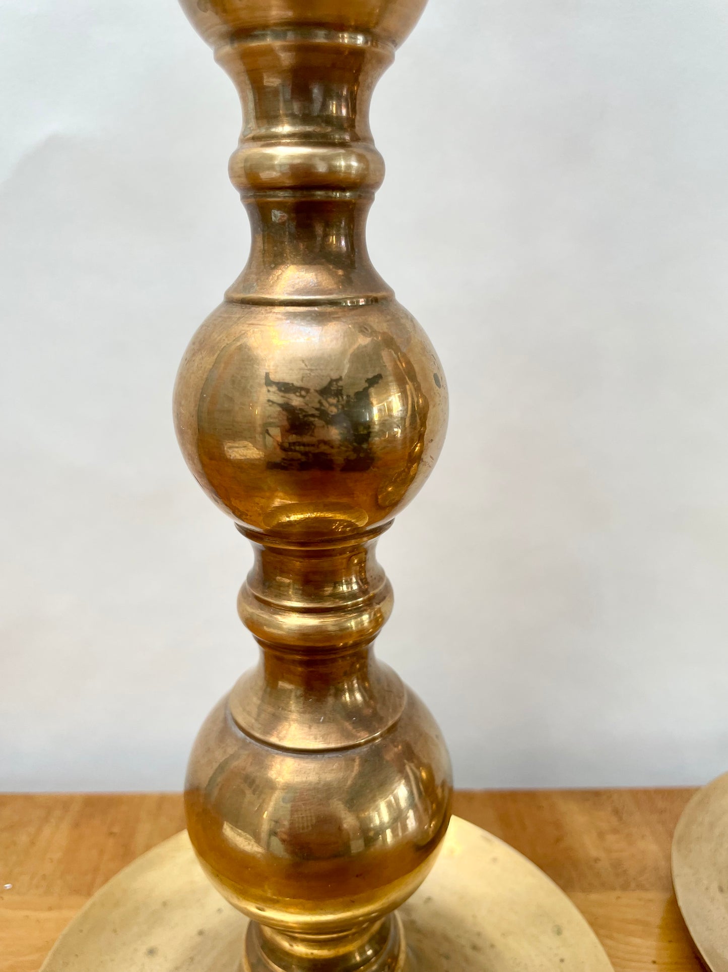 Tall brass mid century candlesticks in the Moroccan style