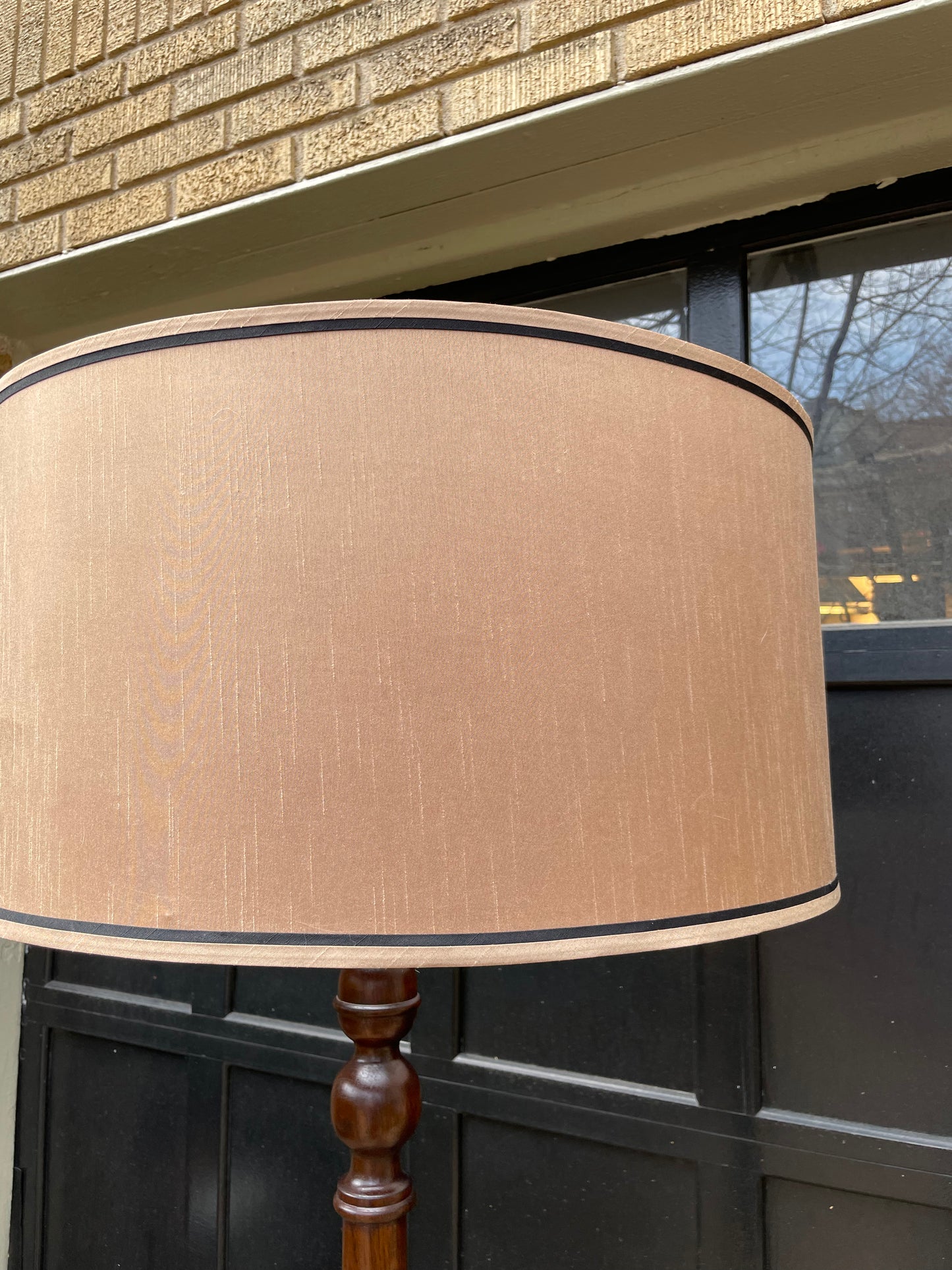 Tall wood floor lamp with a silk shade