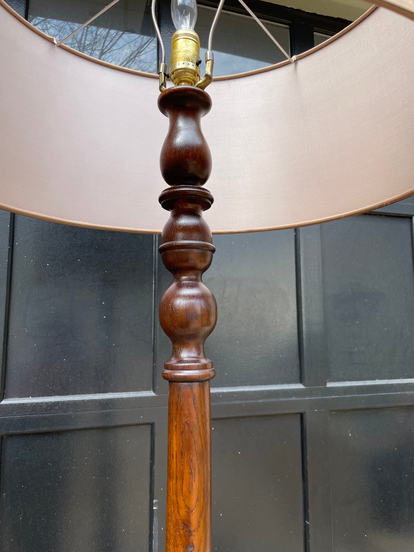 Tall wood floor lamp with a silk shade