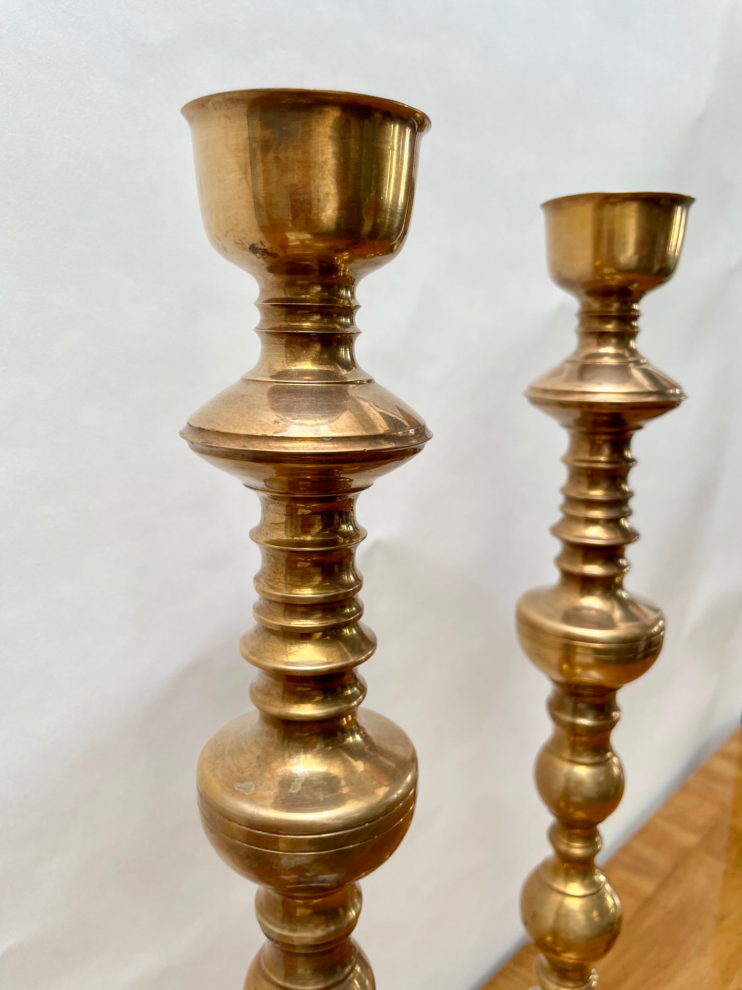 Tall brass mid century candlesticks in the Moroccan style